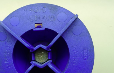 Śruba mocowanie koła zapasowego Nissan 74810 BM410